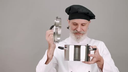 Chef Opens Pot and Smells Aroma