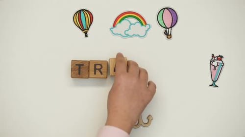 Travel Word on Wooden Cubes Made by Child, School Excursion, Discovering New