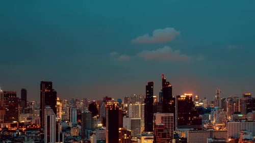 Time Lapse Night Cityscape and Highrise Buildings in Metropolis City Center