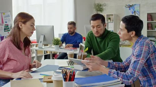 Creative Team Discussing Project
