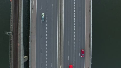 Aerial view of a motorway that passes over a river