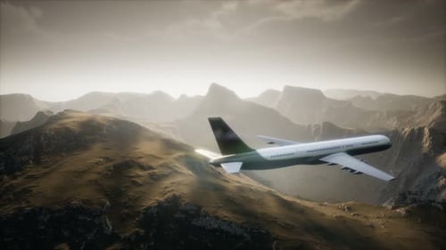 Passenger Aircraft Over Mountain Landscape
