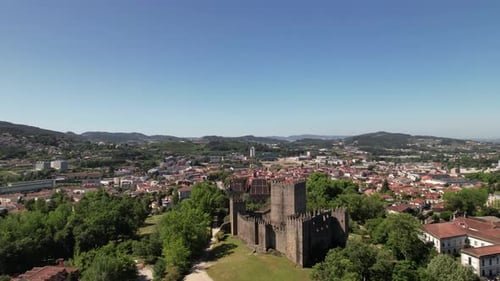 Cinematic aerial over Guimaraes Castle, Portugal
