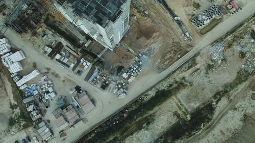 Construction site of a modern city block. High-rise buildings under construction.