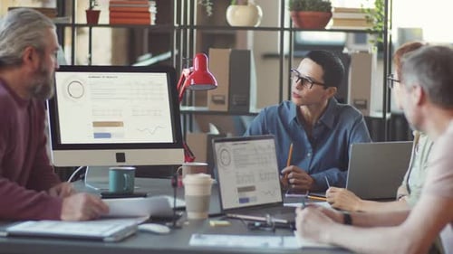 Business Team Discussing Project at Office Meeting