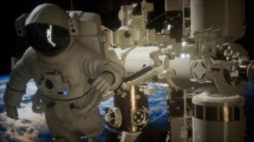 International Space Station and Astronaut in Outer Space Over the Planet Earth