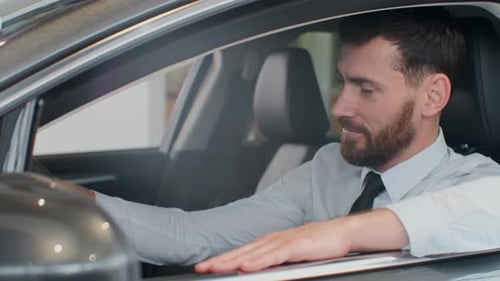 Man in Car Looking Happy and Professional