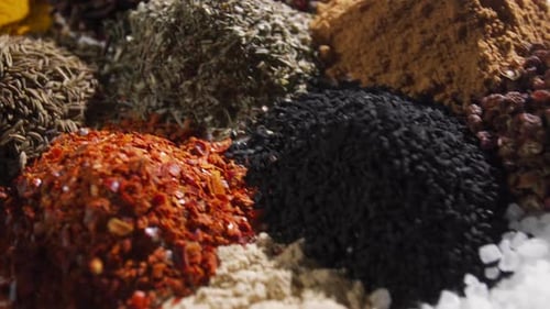 Dynamic Close-Up of Assorted Cooking Spices