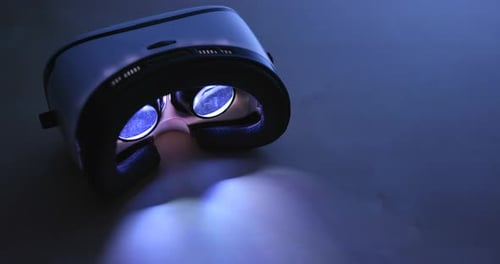 Virtual Reality Headset Lights Shine in the Dark