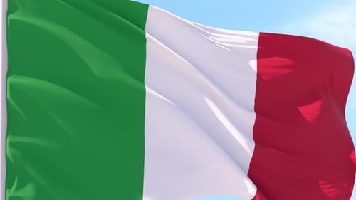 Italian Flag Waving Against Blue Sky