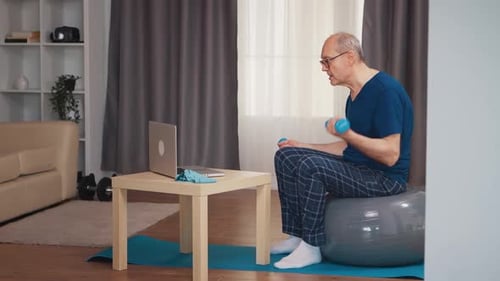 Senior Man Training in Living Room