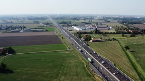 aerial view of highway with flowing traffic