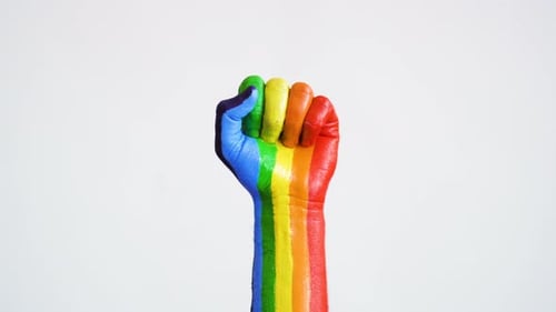 Raised Fist Painted with Pride Rainbow Colors