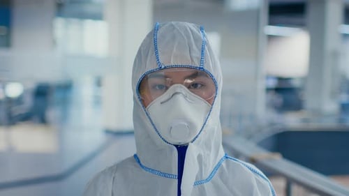 Person in Protective Suit, Face Mask and Goggles
