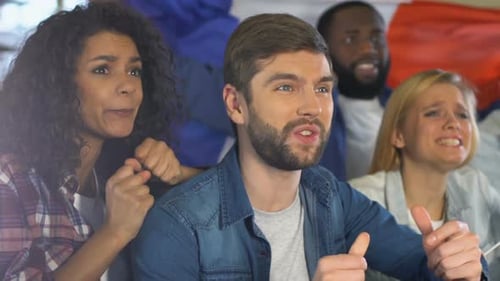 Enthusiastic Group of Sports Fans Cheering