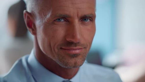 Confident Businessman Close-up in Office Setting