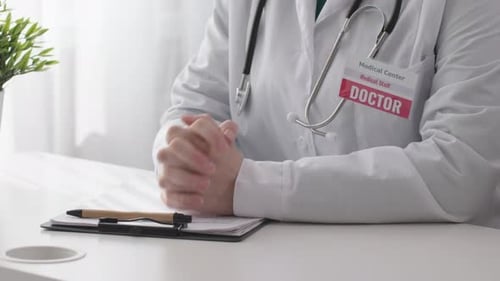 Doctor Hands Female Woman Moving While Talking Sitting at Table Office Room