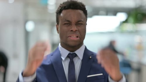 Stressed Adult Male Yelling in an Office