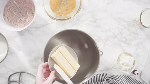 Flat lay. Step by step. Mixing ingredients in a standing kitchen mixer to prepare cream cheese frost