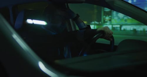 Sleepy Man Driving at Night