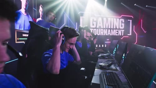 Young Adults Playing in Gaming Tournament