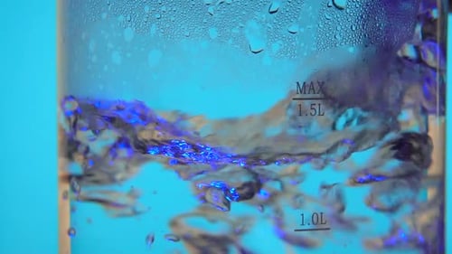 Water Boils Vigorously in Glass Electric Kettle