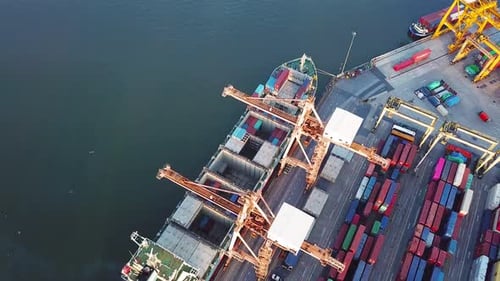 Aerial top view of container cargo ship in the export and import business and logistics