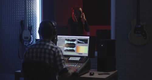 Actor Doing Voice Over in Sound Studio