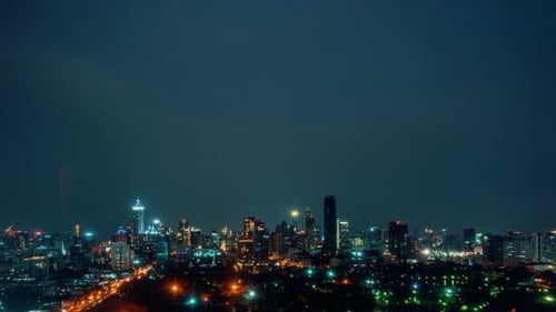 Time lapse night cityscape and high-rise buildings in metropolis city center