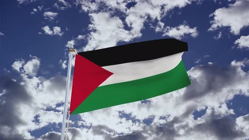 Palestinian Flag Waving in the Wind with Cloudy Sky