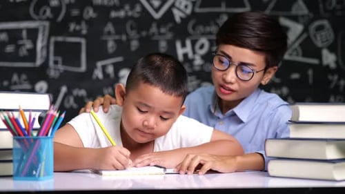 The teacher teaches children who are sleepy in class time.