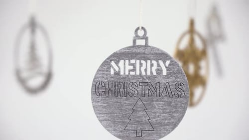 Ornement en argent avec inscription « Joyeux Noël »
