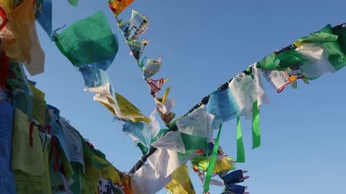 Prayer Flags Blowing in the Wind on Sunny Day