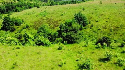 Aerial drone view of a flying over the rural agricultural landscape.