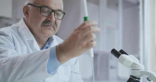 Close Up of Scientist Conducting an Experiment