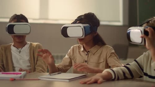 Surprised Schoolchildren Using 3d Vr Glasses at Lesson in Elementary School