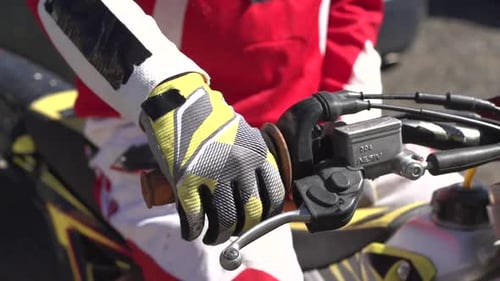 Motorcycle Rider Twisting the Throttle Handle Bars