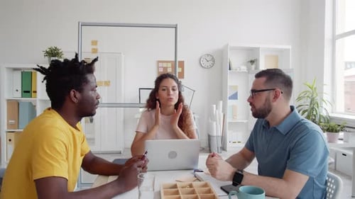 Team Meeting in Modern Office Space