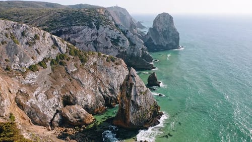 Aerial View of Rocky Cliff Coastline Near Praia Da Ursa Beach and Cabo Da Roca Located on Atlantic