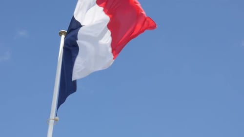 French Flag Waving in the Blue Sky