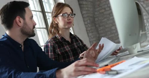 Collaborative Architects Work Together on Computer