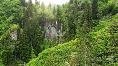 Beautiful Summer Waterfall in the Forest Magical Morning Nature Landscape in Sunny Weather Aerial
