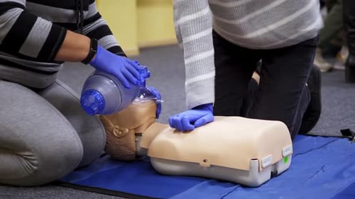 CPR Training on Medical Mannequin With Bag Valve Mask