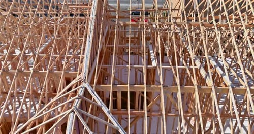 Aerial Panoramic Top View on Wooden Roof Beams Trusses System Framed Construction