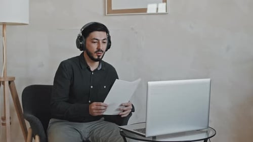 Young Adult Attends Virtual Meeting From Home