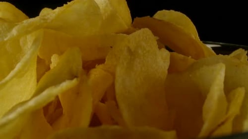Crispy Potato Chips in Close Up Macro Shot