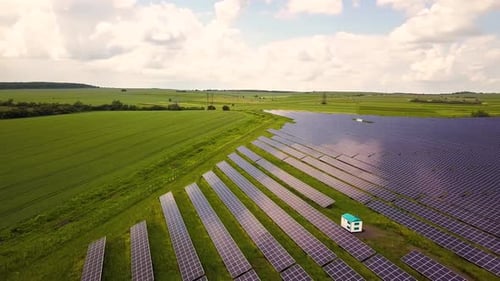 Aerial view of solar power plant field. Electrical photovoltaic panels for producing clean ecologic