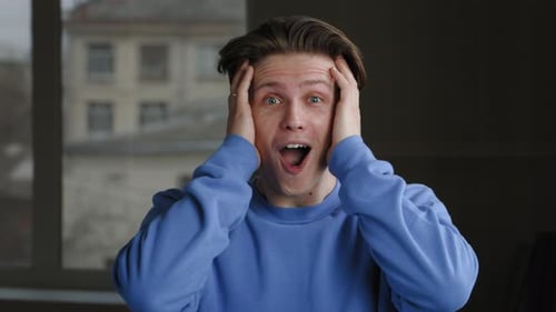 Young Adult is Shocked Indoors