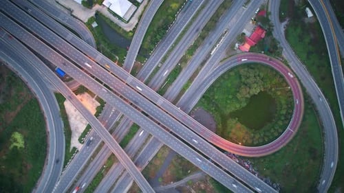 4K : Aerial Hyper lapse drone view of road junction with moving cars.