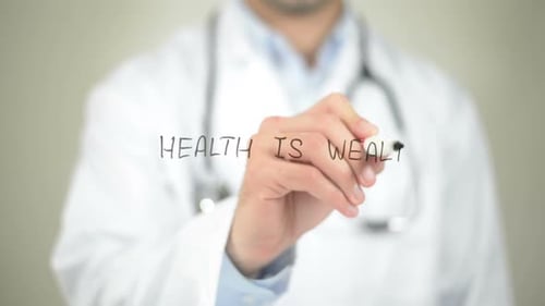 Doctor Writing Health is Wealth